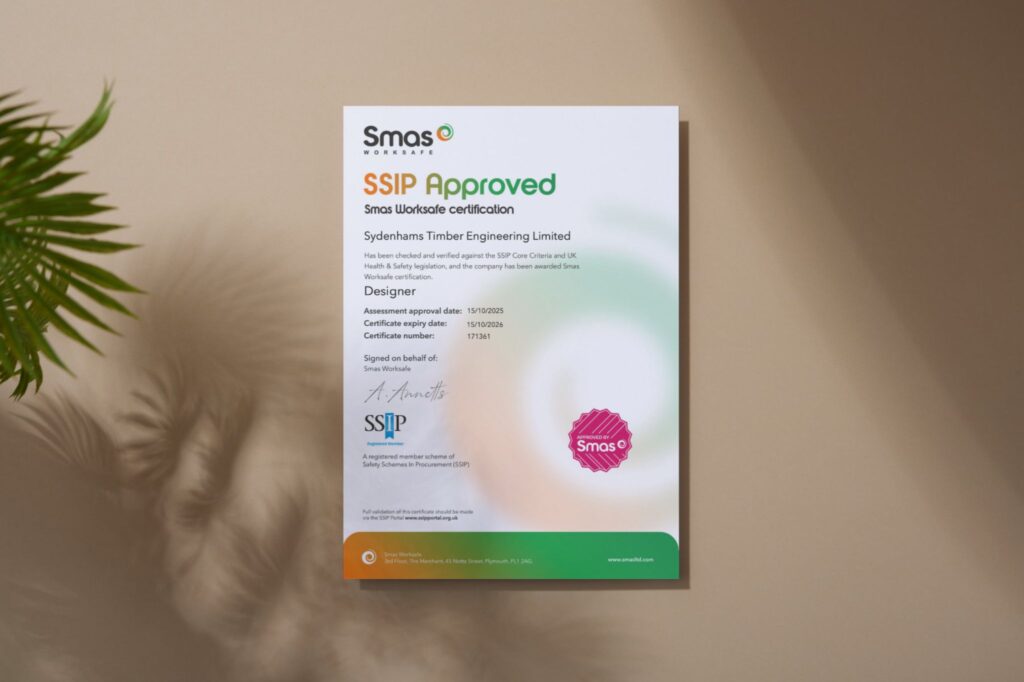 SSIP accreditation certificate from Smas Worksafe on a wall, highlighting Sydenhams Timber Engineering safety.